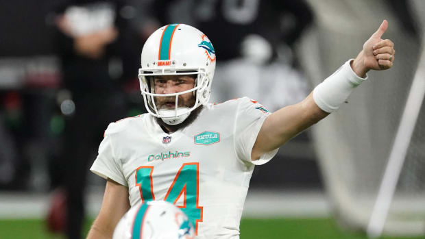 Miami Dolphins quarterback Ryan Fitzpatrick gestures in the fourth quarter against the Las Vegas Raiders at Allegiant Stadium.